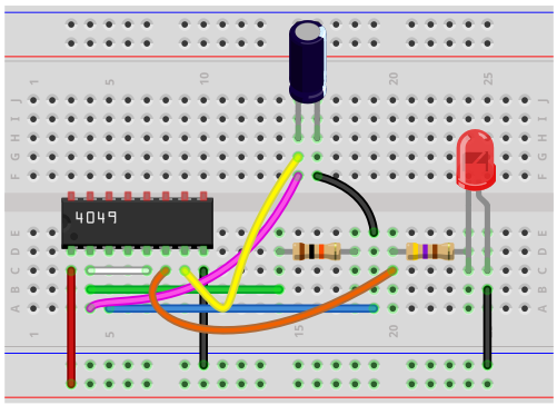 Astable multivibrator breadboard circuit with a 4049 inverter